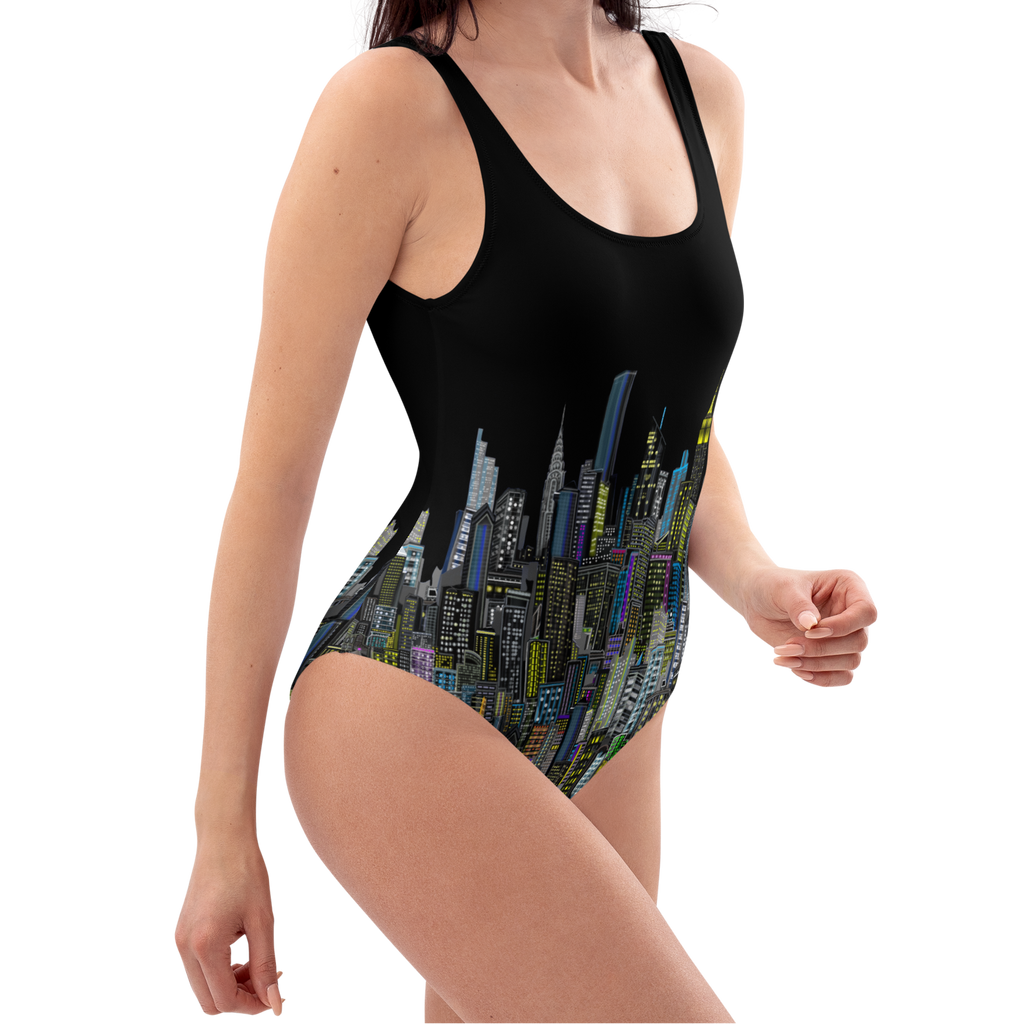 Woman wearing a black one-piece swimsuit with cityscape Loria NYC Art design on a white background