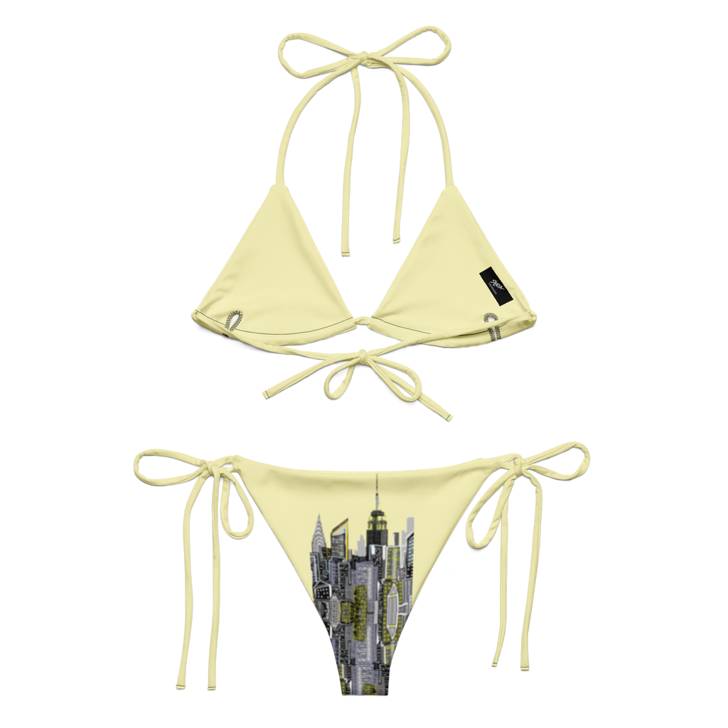 Yellow bikini set with cityscape Loria NYC Art design on a white background