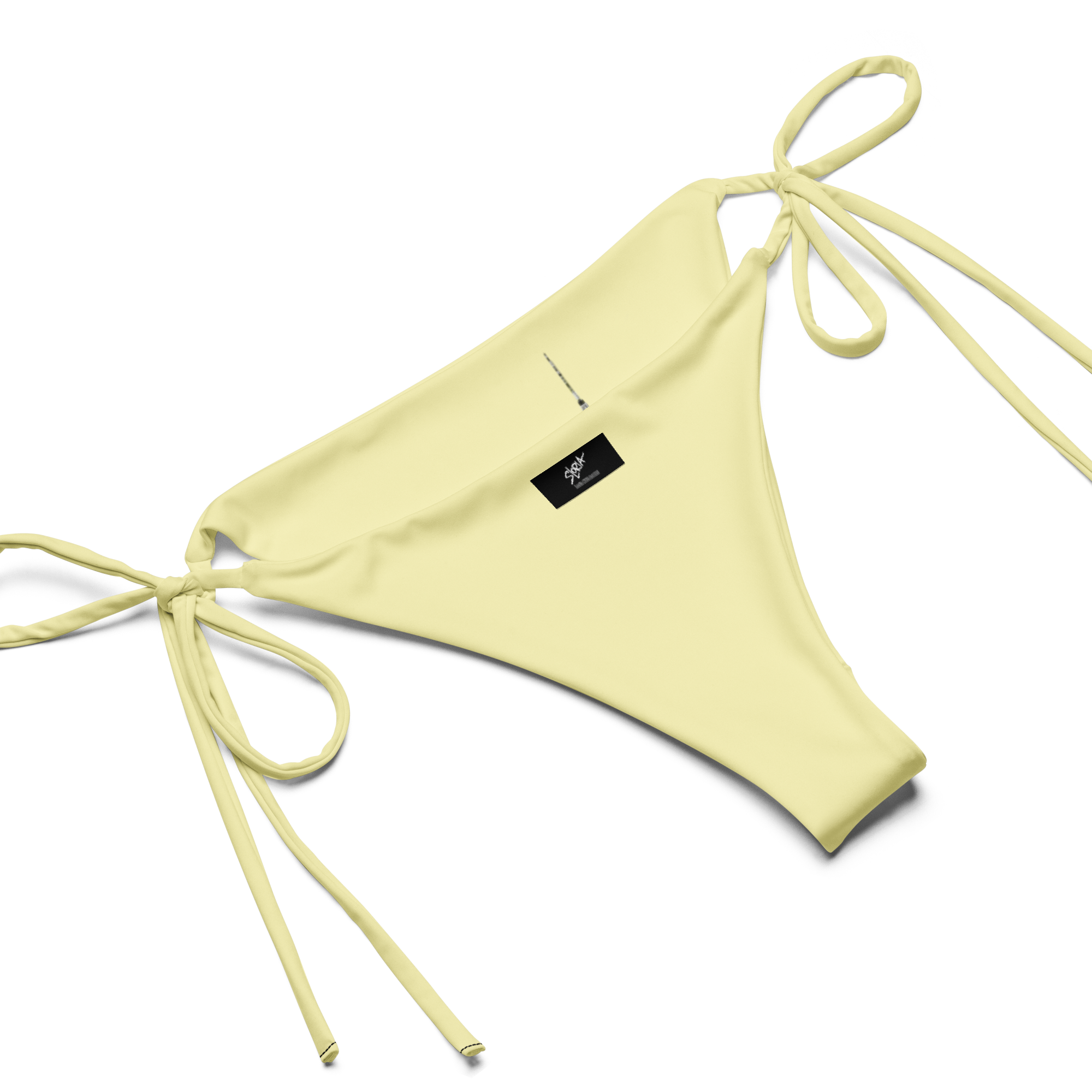 Yellow bikini Loria NYC Art bottom with thin straps on a white background