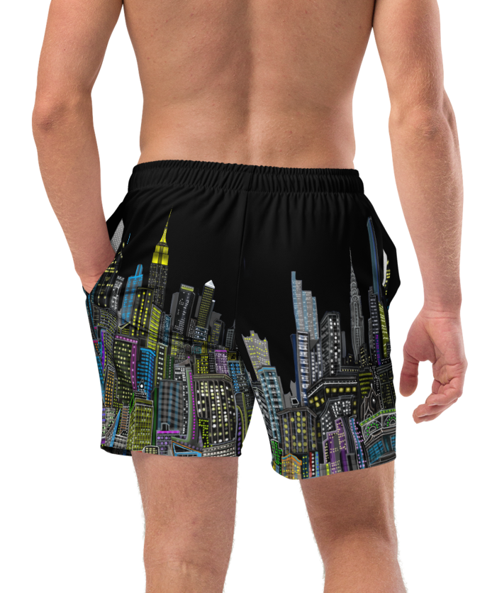 Man wearing black swim shorts with cityscape Loria NYC Art design on a white background