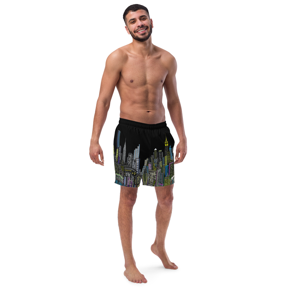 Man wearing black swim shorts with cityscape Loria NYC Art design on a white background