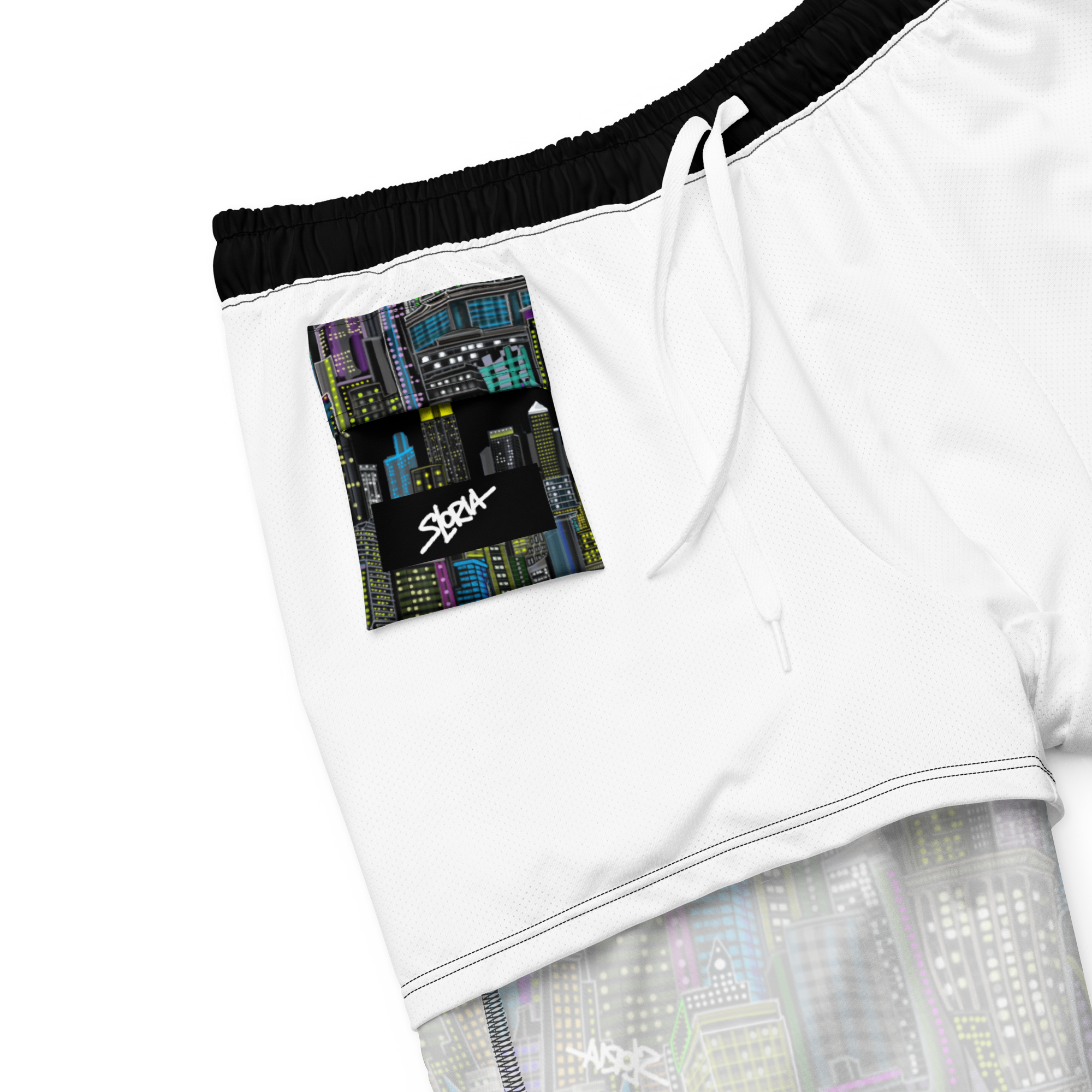 White athletic Loria NYC Art shorts with black waistband and colorful label on a white background