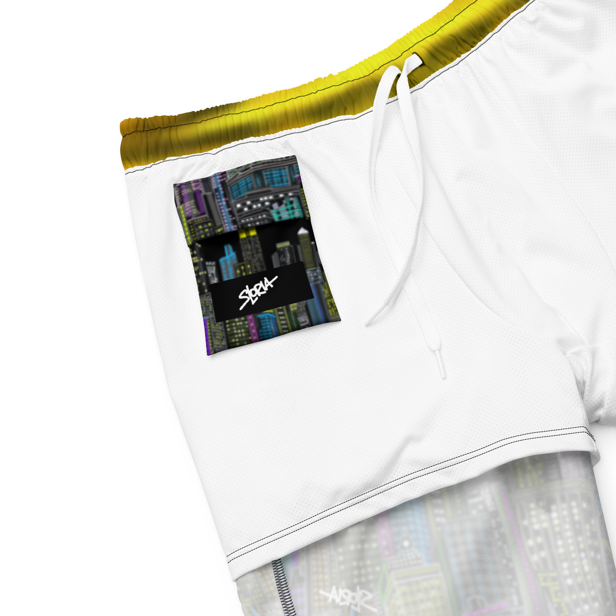 White athletic shorts with a colorful Loria NYC Art label on a white background