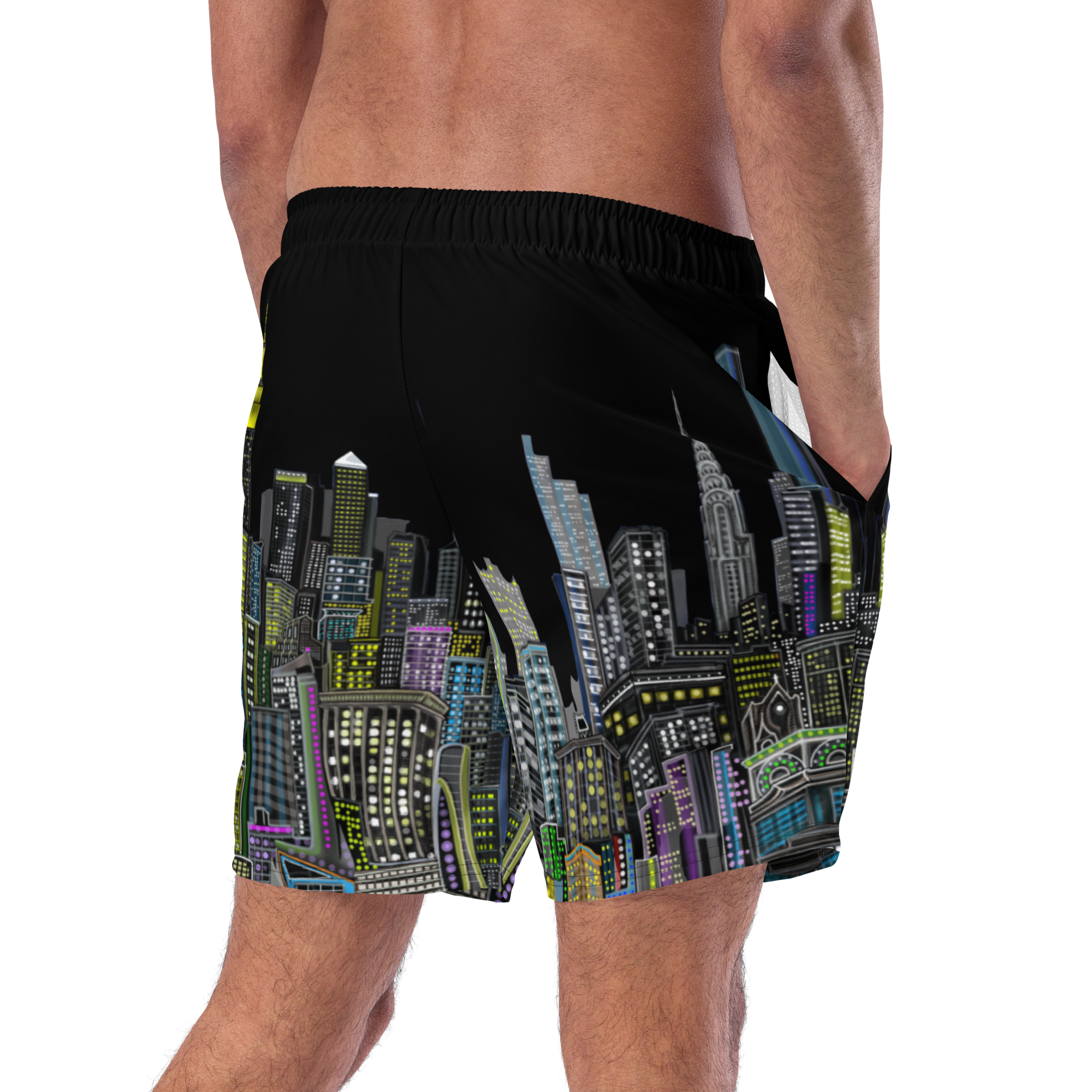 Black shorts with a colorful Loria NYC Art cityscape pattern worn by a person on a white background