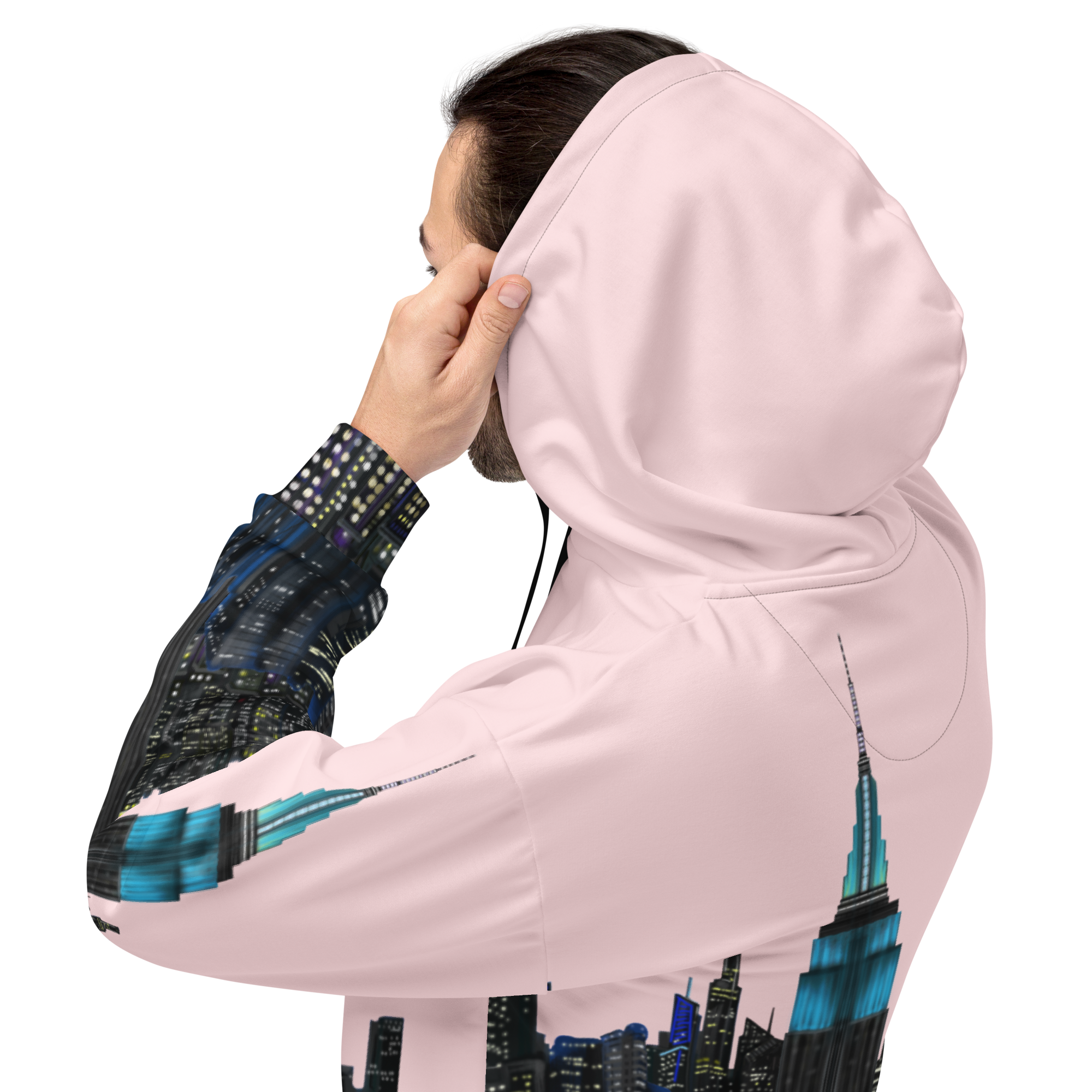 Person wearing a pink Loria NYC Art hoodie with a cityscape design on a white background