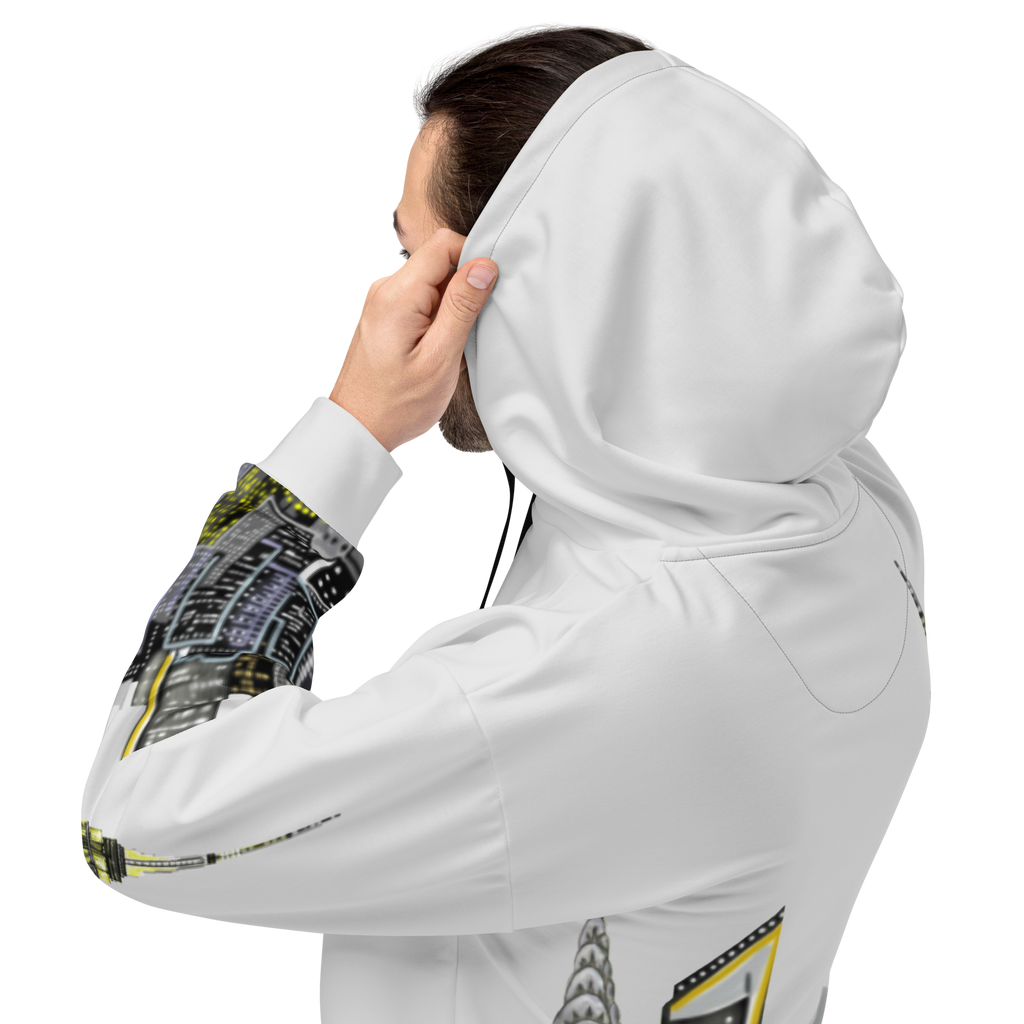 Person wearing a white hoodie with graphic Loria NYC Art designs on sleeves and bottom