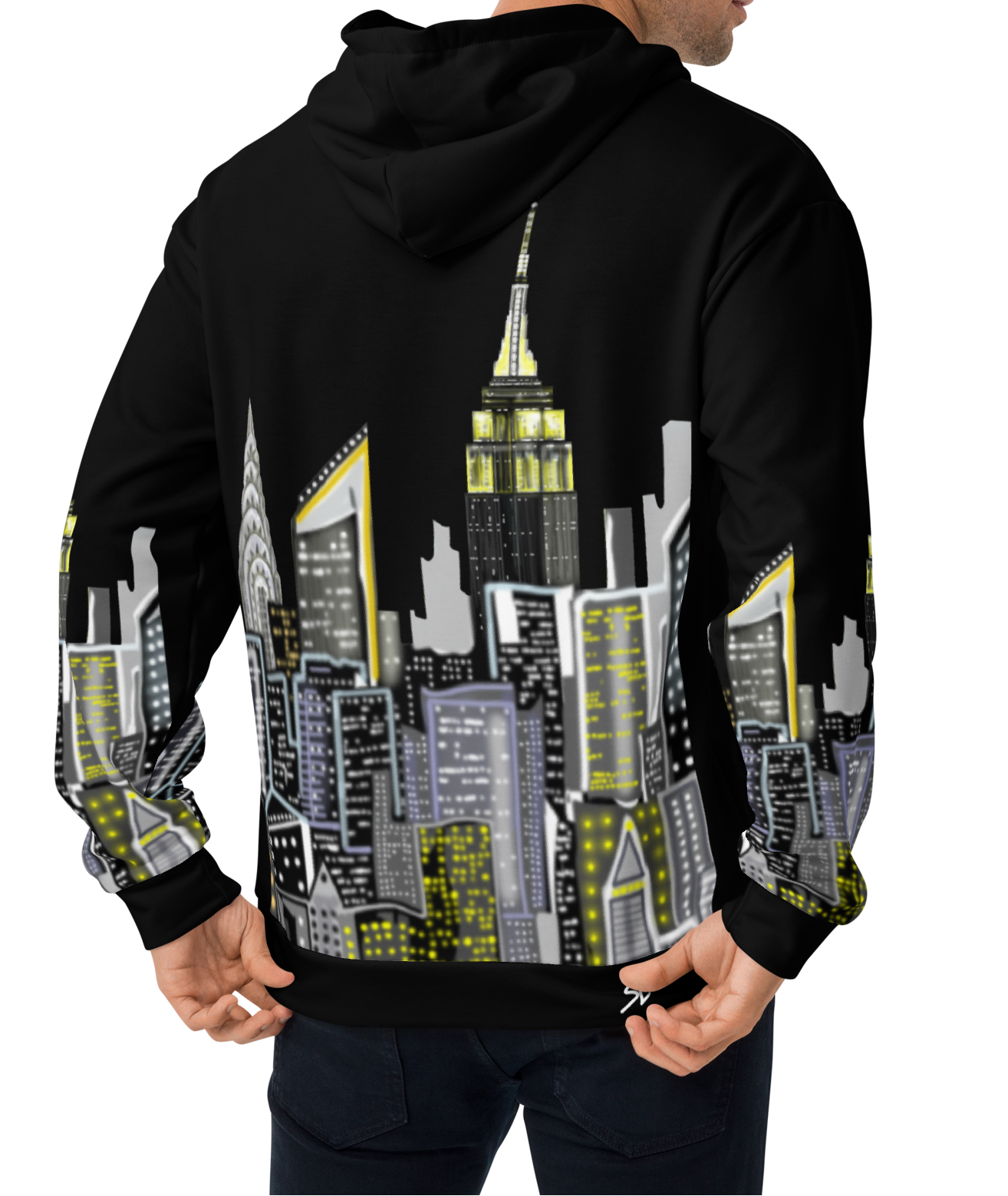Person wearing a black hoodie with a cityscape Loria NYC Art design on the back, standing against a white background.