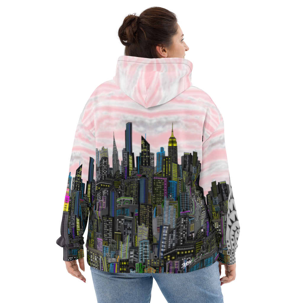 Person wearing a jacket with a cityscape Loria NYC Art  design on the back, standing against a white background