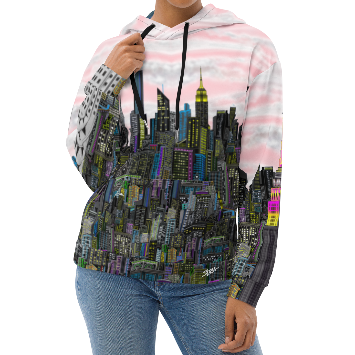 Woman wearing a hoodie with a Loria NYC Art cityscape design on a white background