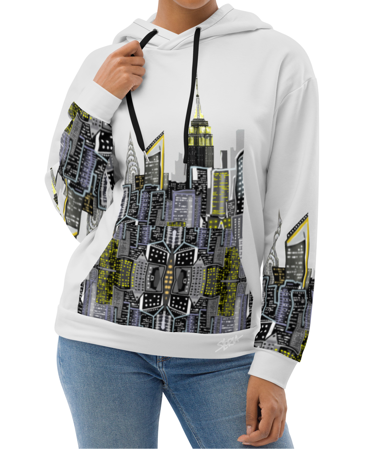 Woman wearing a white hoodie with Loria NYC Art cityscape design on a white background