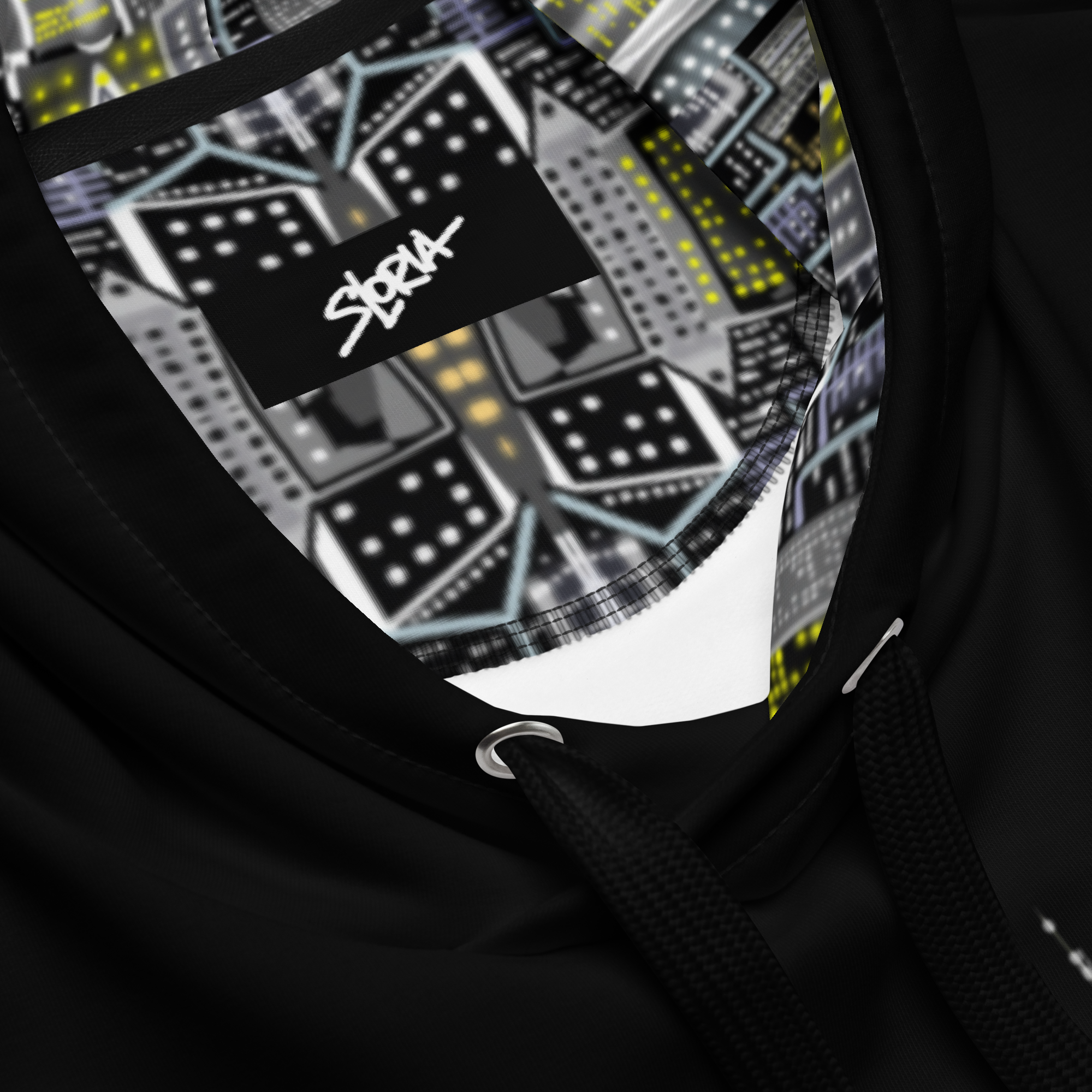 Close-up of a black Loria NYC Art hoodie with a geometric pattern and brand logo.