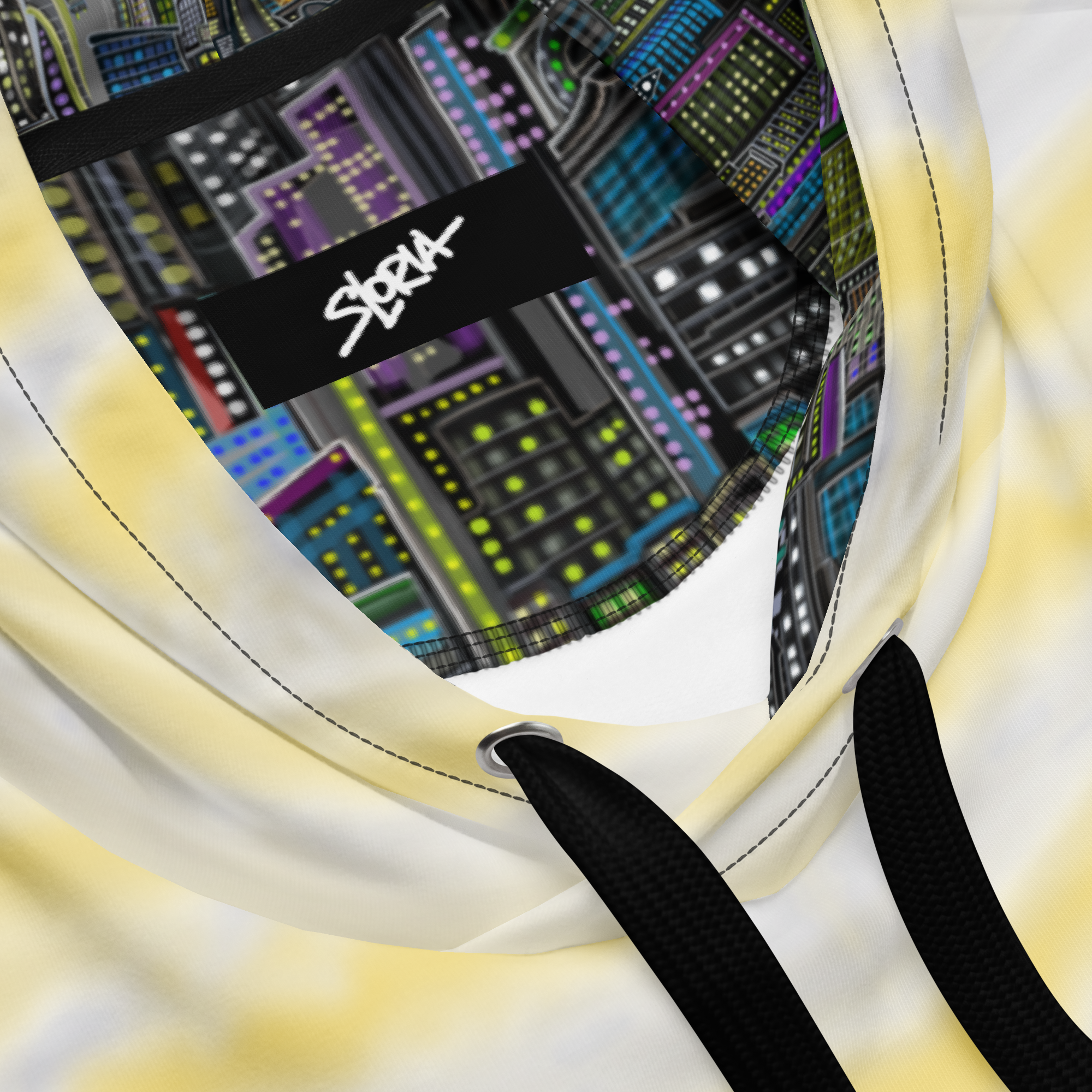 Close-up of a hoodie with a colorful Loria NYC Art cityscape pattern and a brand logo on a white background.