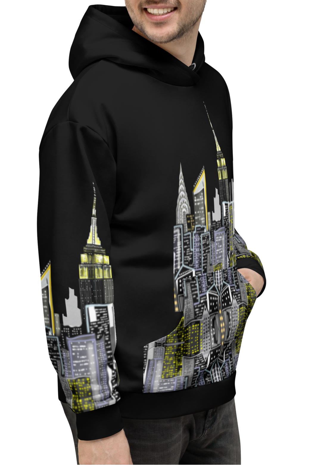 Person wearing a Loria NYC Art black hoodie with cityscape design on a white background