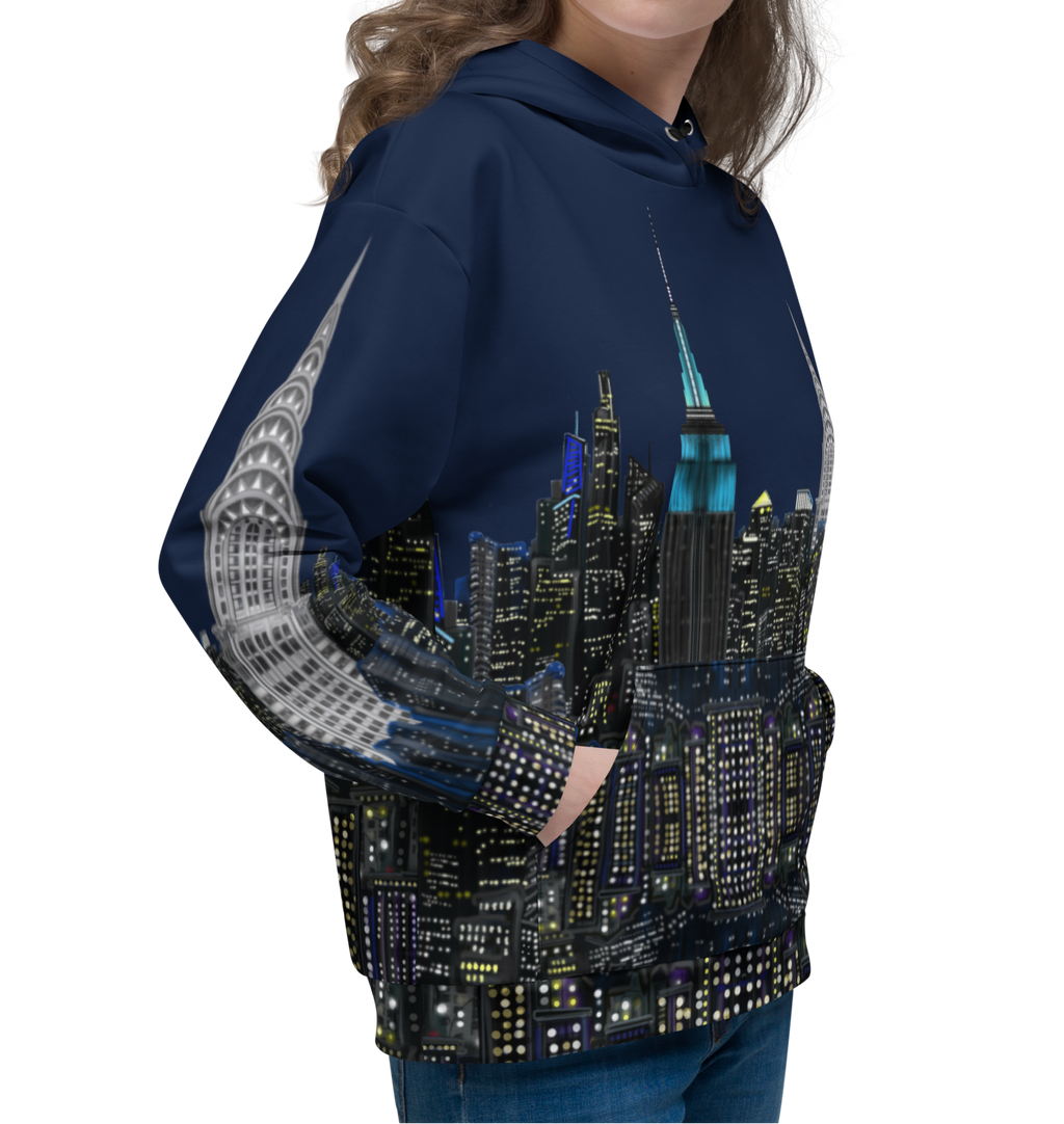 Woman wearing a hoodie with a Loria NYC Art cityscape design on a white background