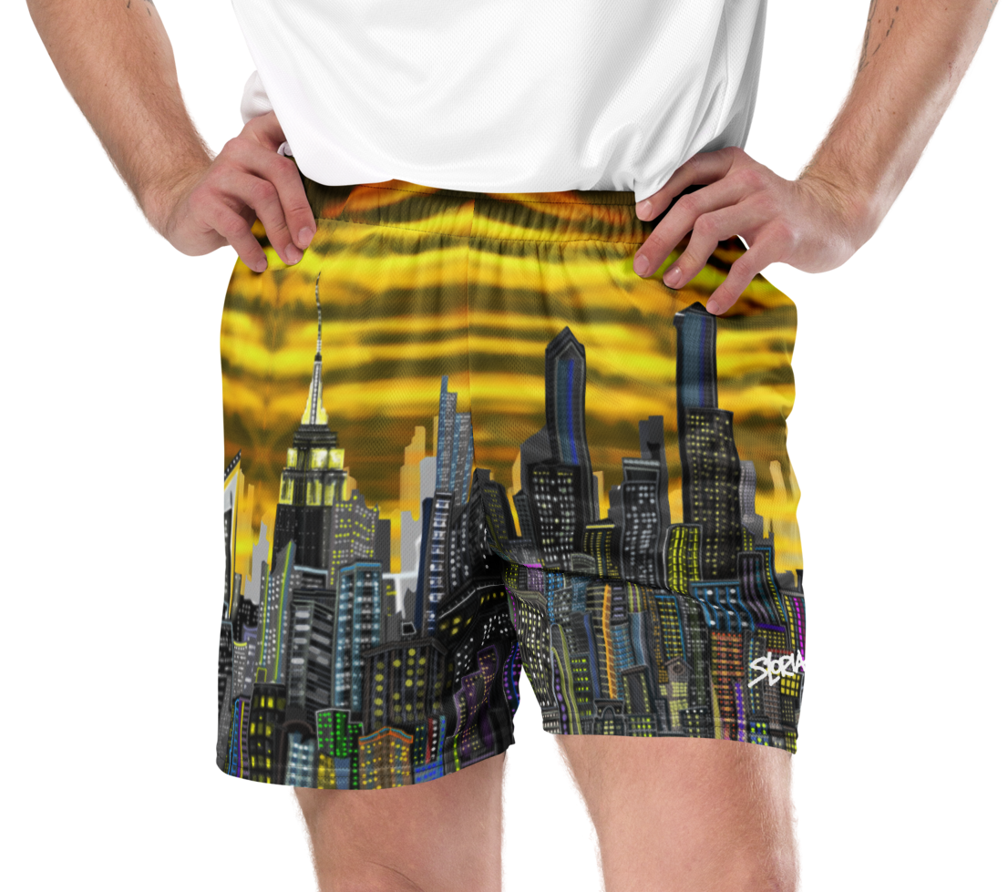 Person wearing a colorful Loria NYC Art cityscape shorts on a white background