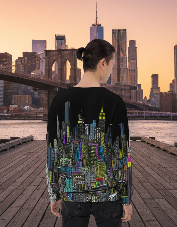 Back of Person wearing a black sweatshirt with a colorful cityscape design by Loria NYC Art on a urban background