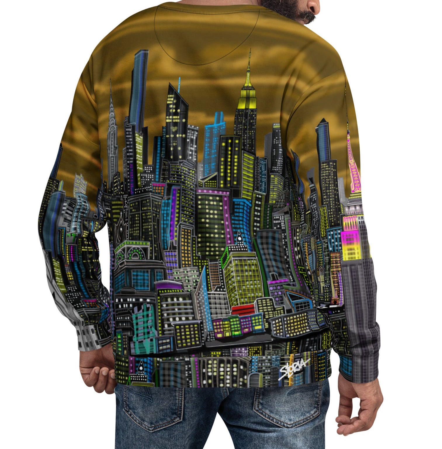 Man wearing a sweater with a cityscape design by Loria NYC Art, standing against a white background.