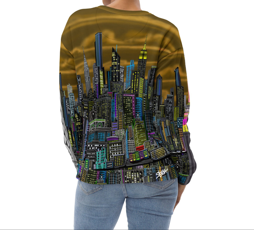 Person wearing a long-sleeve shirt with a cityscape design by Loria NYC Art  a white background