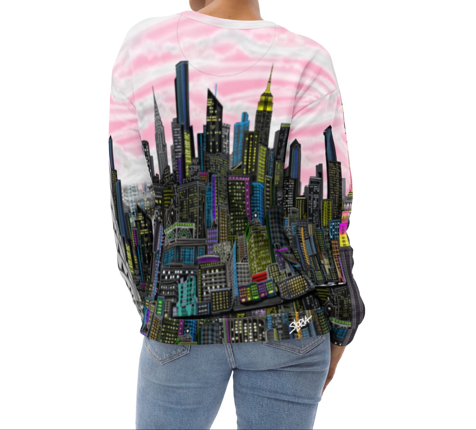 Person wearing a sweater with a cityscape Loria NYC Art design on a white background