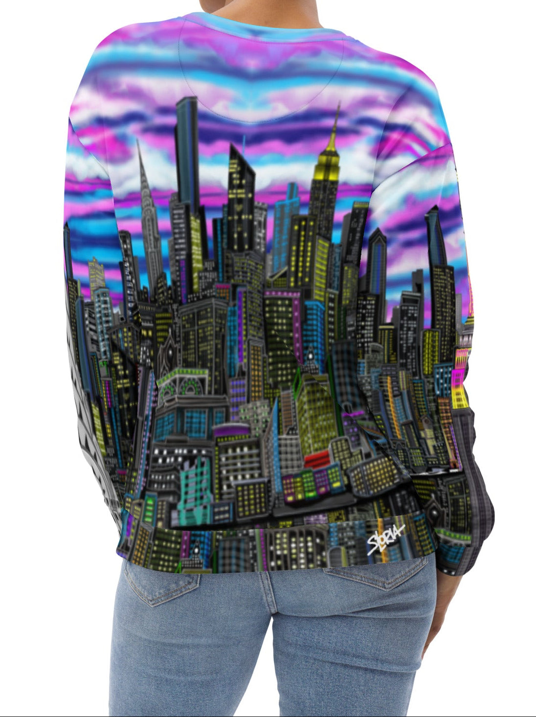 Back of Women wearing a colorful sweat shirt design by Loria NYC Art with a cityscape design on a white background