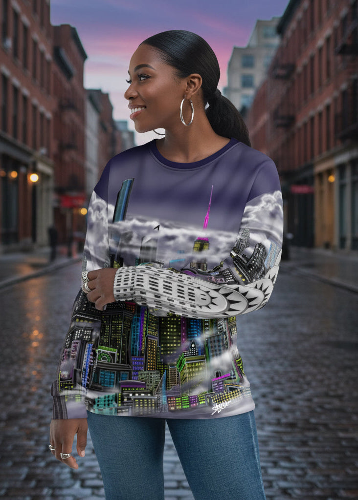 Person wearing a sweater designed by Loria NYC Art with a cityscape design on a urban background