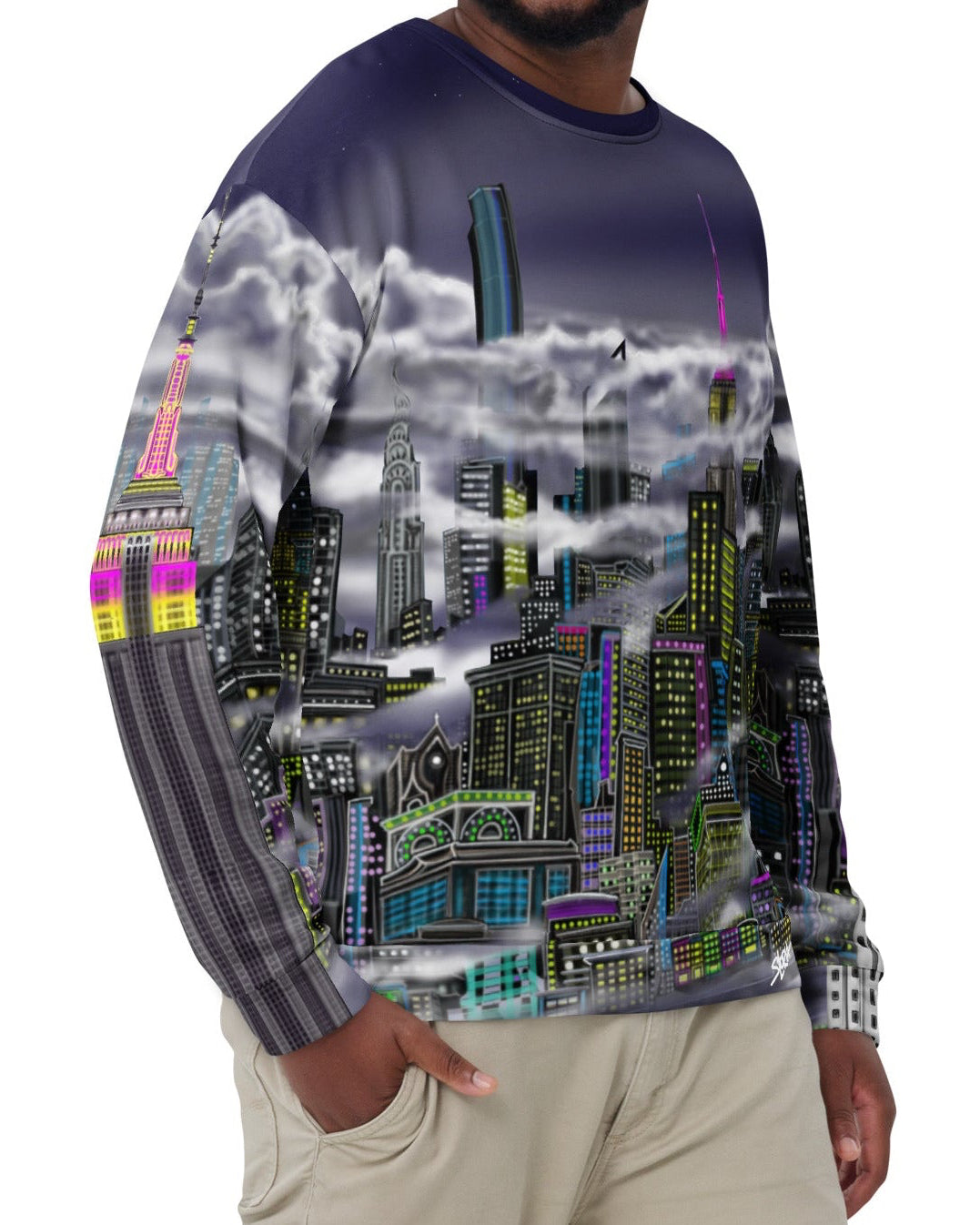 Man wearing a long-sleeve shirt with a cityscape Loria NYC Art design on a white background