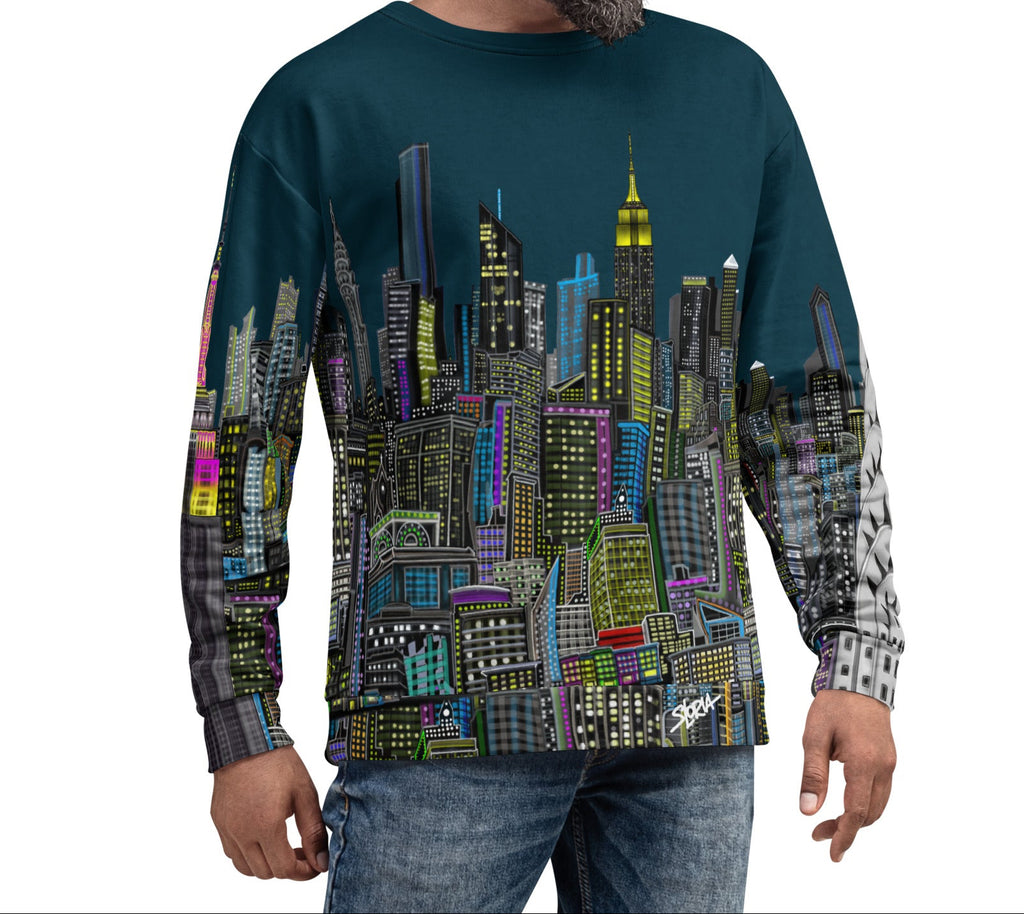 Man wearing a sweater with a cityscape design by Loria NYC Art on a white background