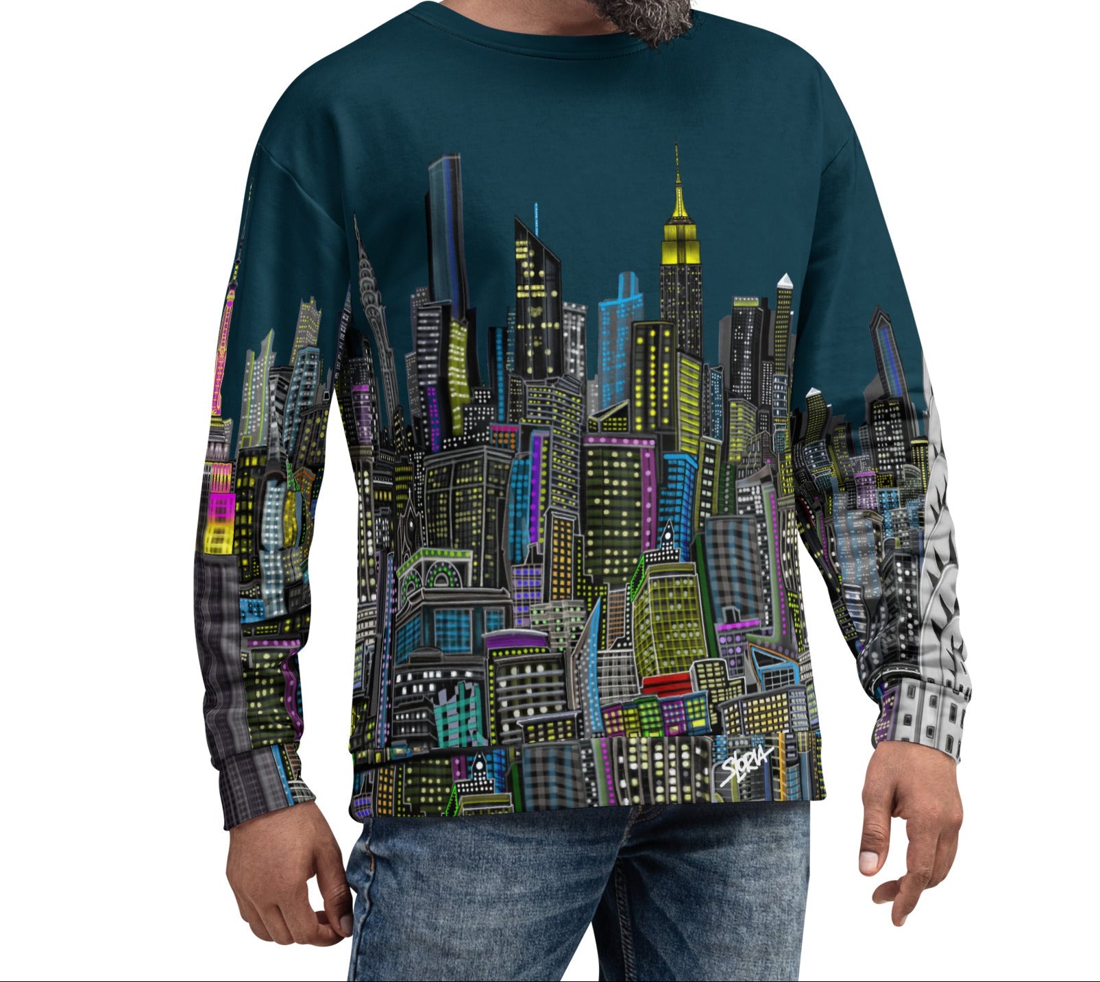 Man wearing a sweater with a cityscape design by Loria NYC Art on a white background