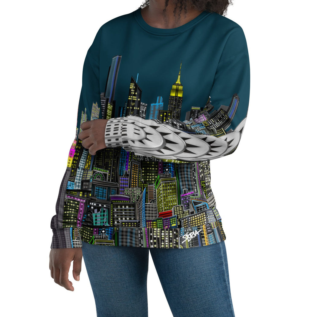 Lady wearing a long-sleeve shirt with a cityscape design by Loria NYC Art on a white background