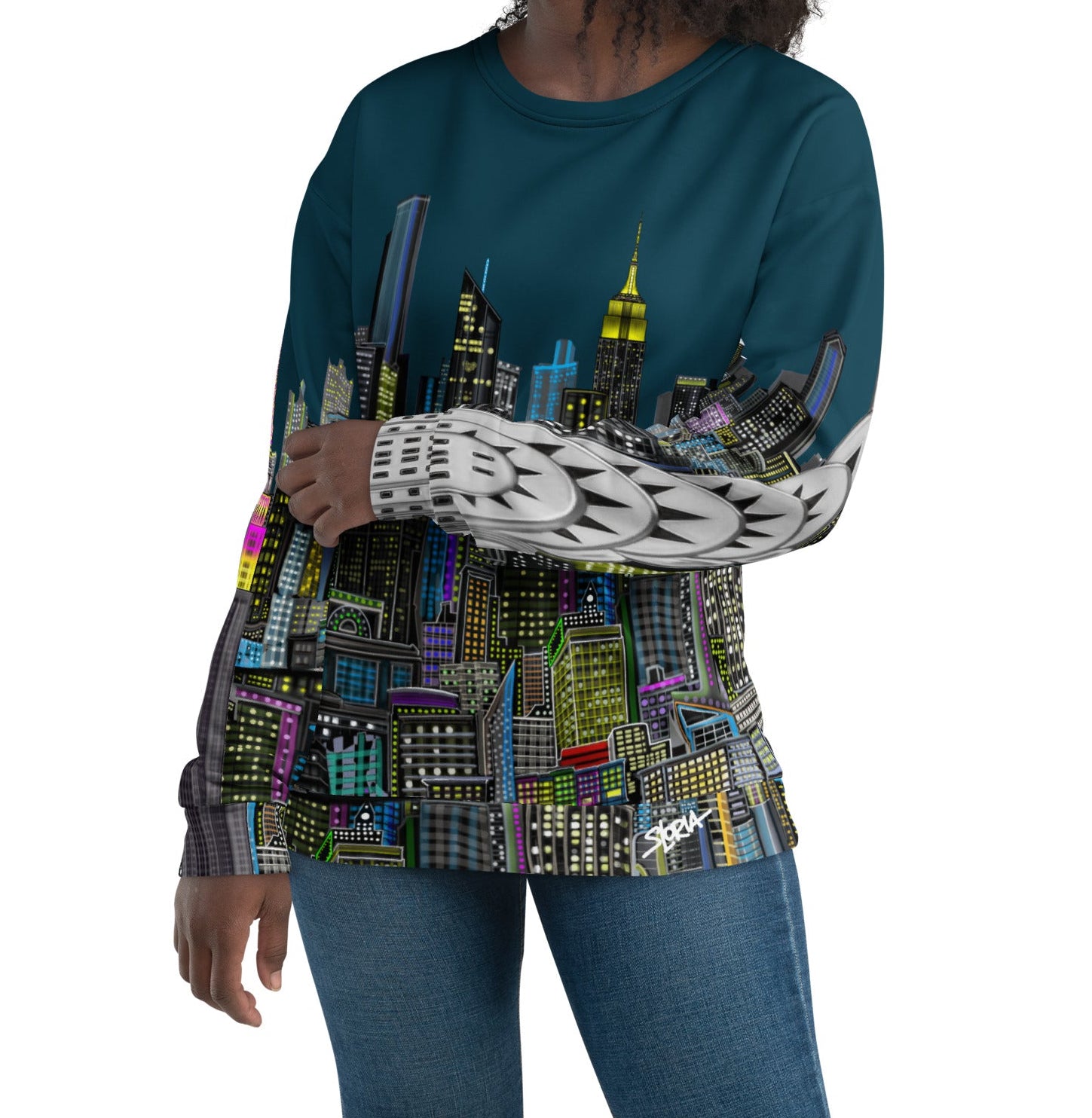 Lady wearing a long-sleeve shirt with a cityscape design by Loria NYC Art on a white background