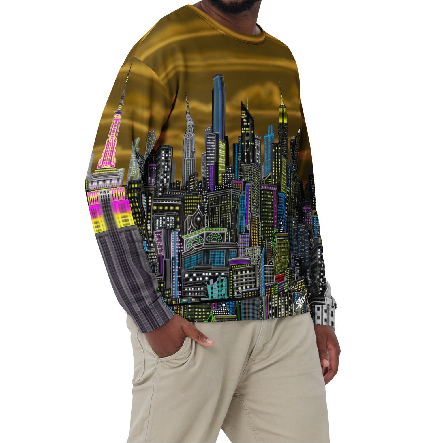 Man wearing a sweater with a colorful cityscape design by Loria NYC Art on a white background
