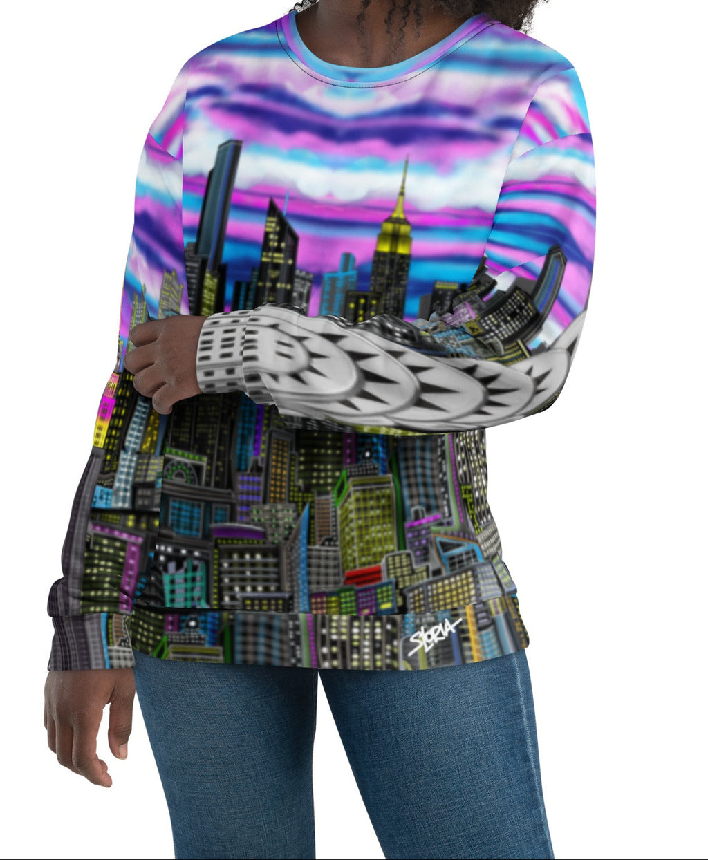 Women posing by wearing a colorful sweat shirt design by Loria NYC Art with a cityscape design on a white background