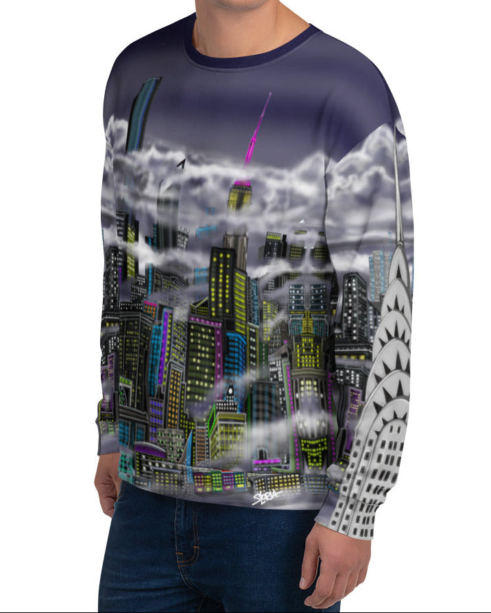 Person wearing a long-sleeve shirt with a cityscape Loria NYC Art design on a white background