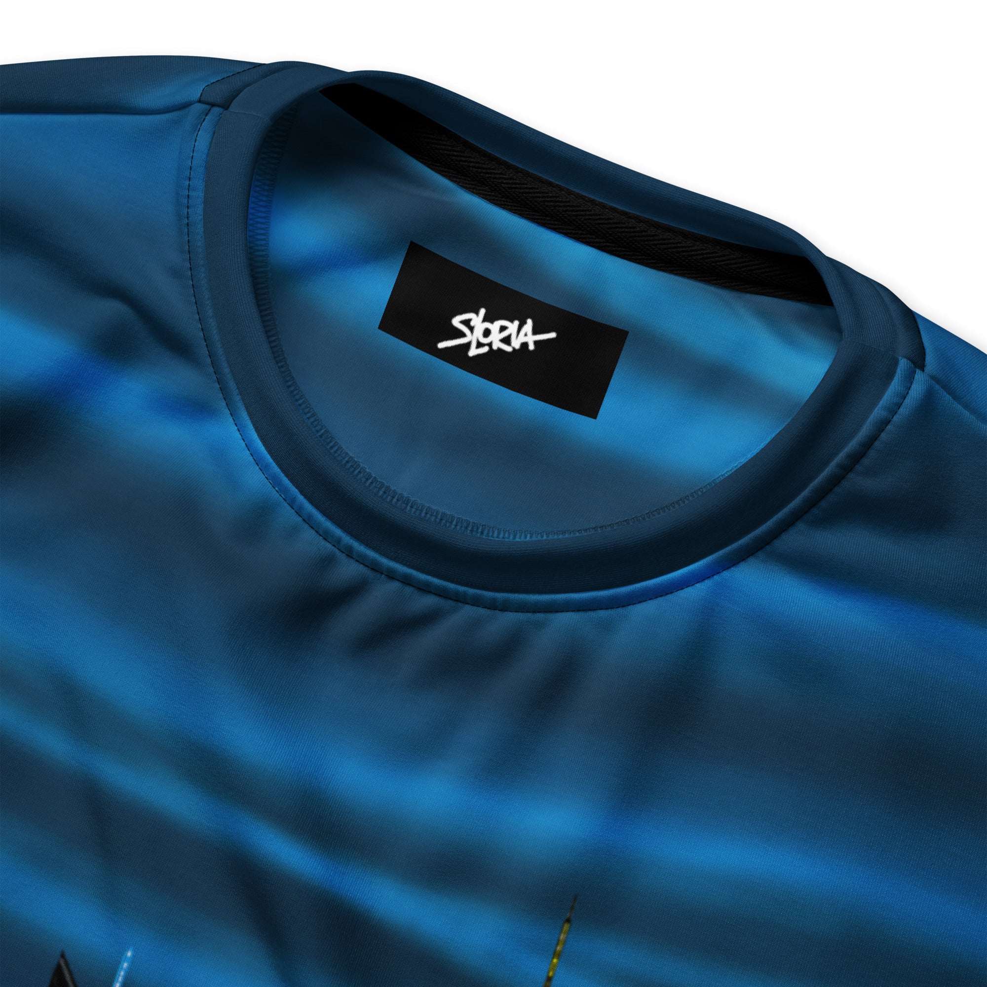 Blue t-shirt with a black label S.Loria on a white background