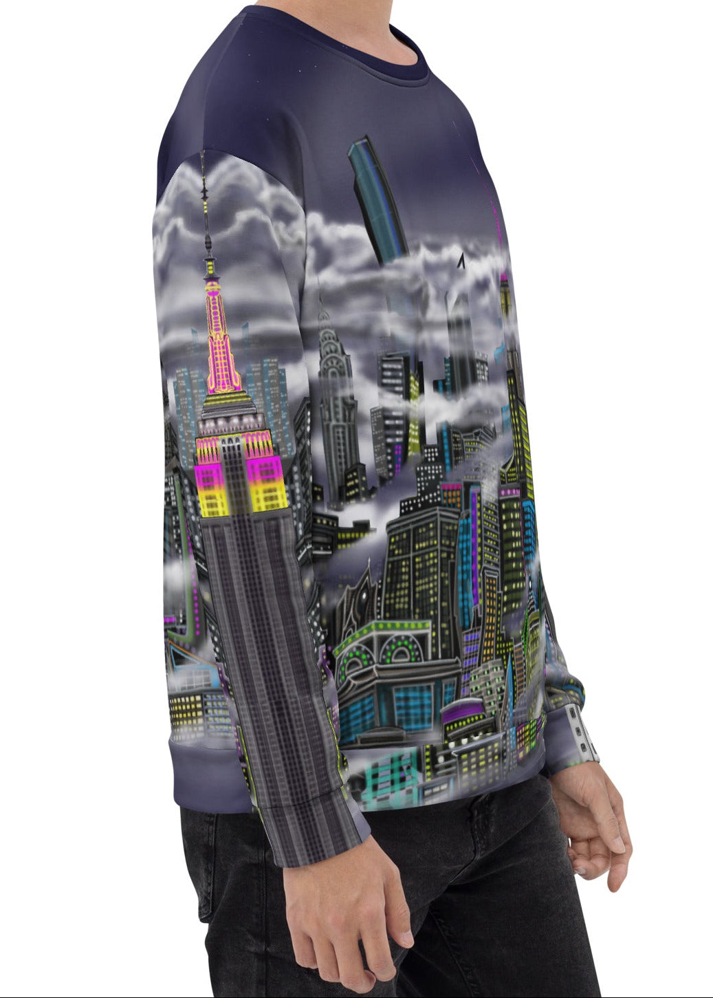 Person wearing a sweater designed by Loria NYC Art with a cityscape design on a white background