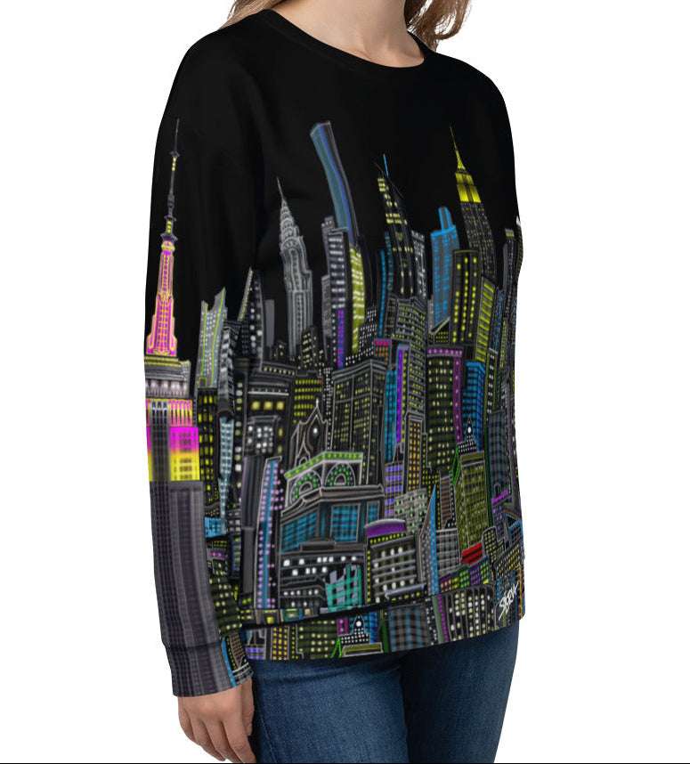 Side front of Girl wearing a black sweatshirt with a colorful cityscape design by Loria NYC Art on a white background