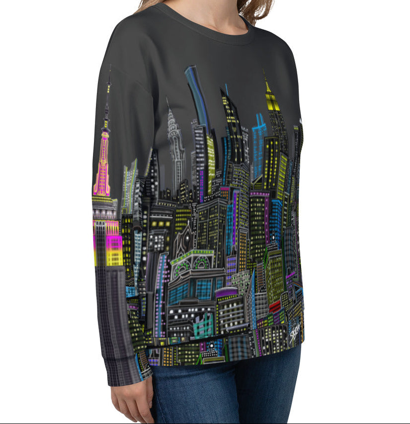 Female showing side front view  of Sweatshirt with a charcoal grey sky colorful cityscape design by Loria NYC Art on a white background