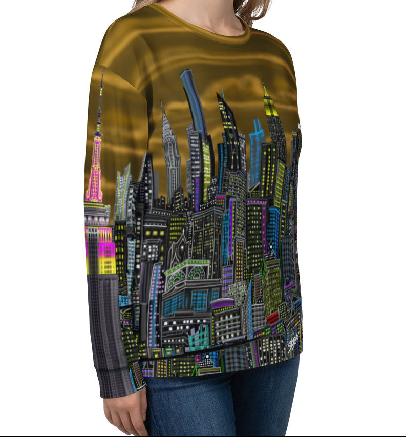Side front of girl wearing a Long-sleeve shirt with a colorful cityscape design by Loria NYC Art on a white background