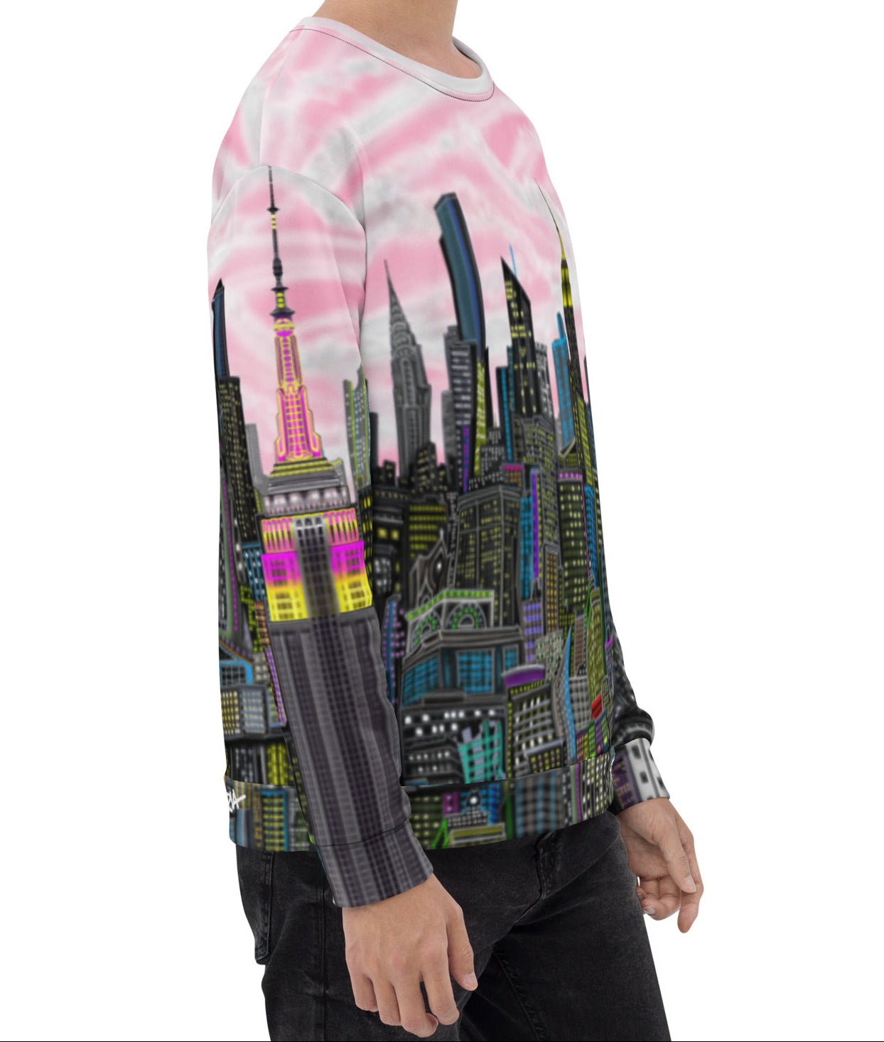 Person wearing a colorful Loria NYC Art cityscape sweater on a white background