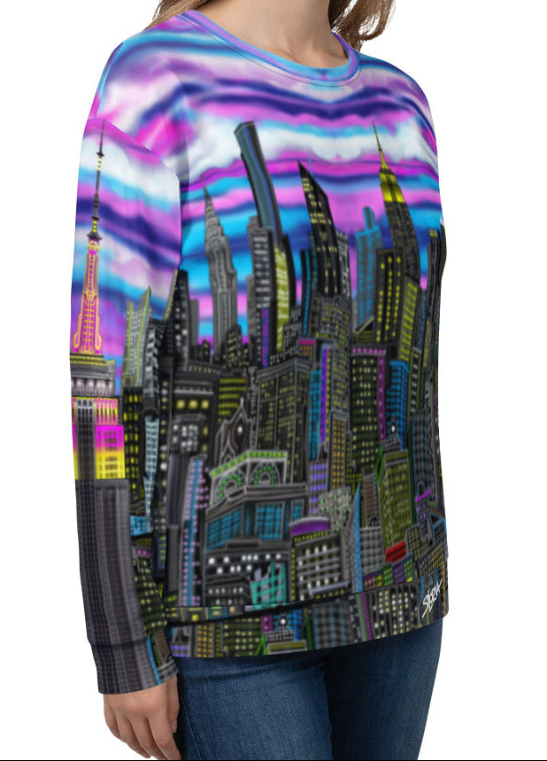 Colorful long-sleeve shirt with cityscape design by Loria NYC Art on a white background