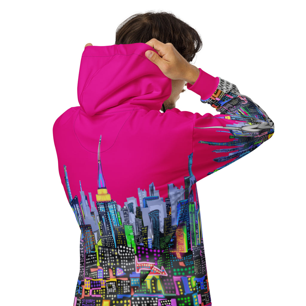 Person wearing a pink fuchsia Loria NYC Art hoodie with a colorful cityscape design on the back, on a white background.
