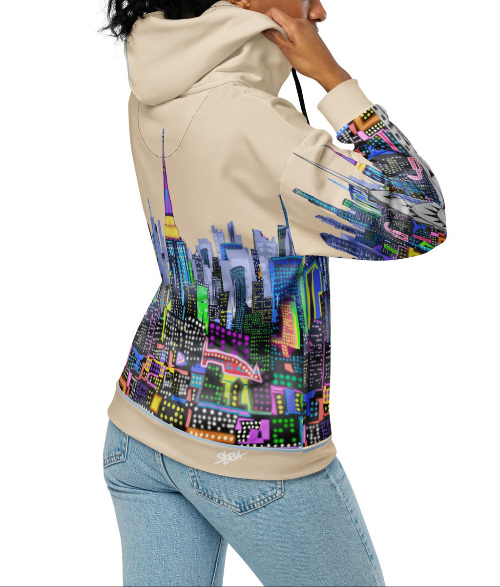 Person wearing a hoodie with a colorful cityscape Loria NYC Art design on a white background