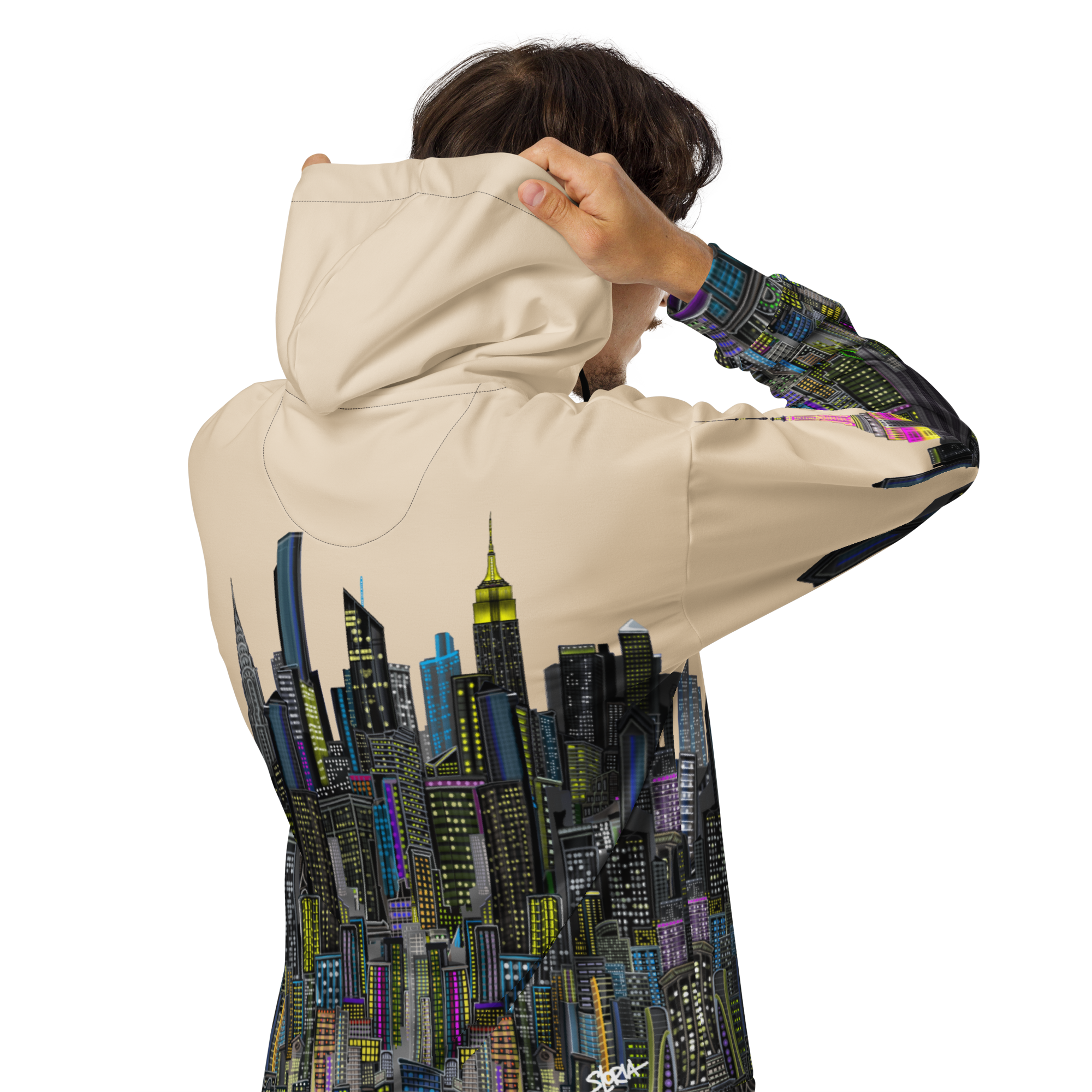 Person wearing a beige hoodie with a cityscape Loria NYC Art design on the back, on a white background