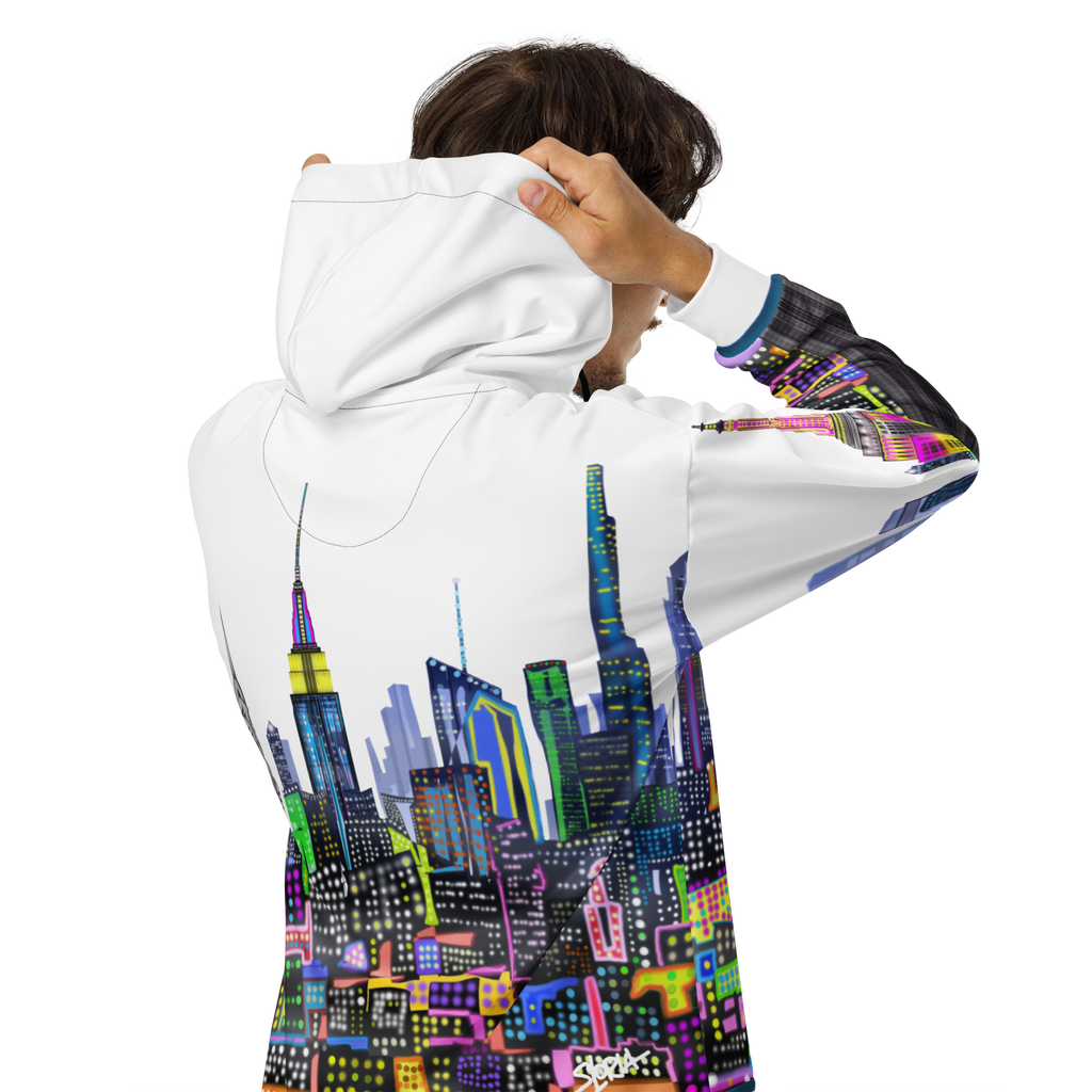 Person wearing a hoodie with a Loria NYC Art colorful cityscape design on a white background