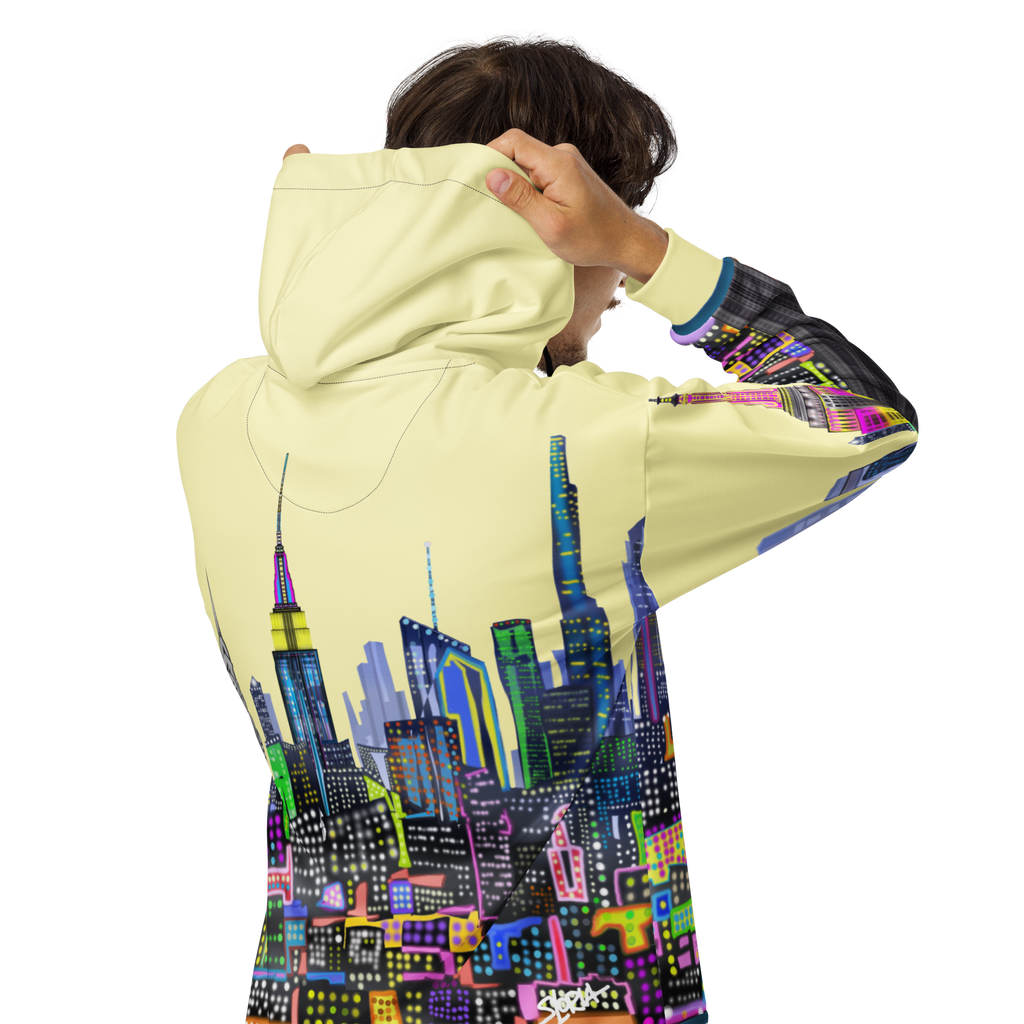 Person wearing a hoodie with a Loria NYC Art colorful cityscape design on the back