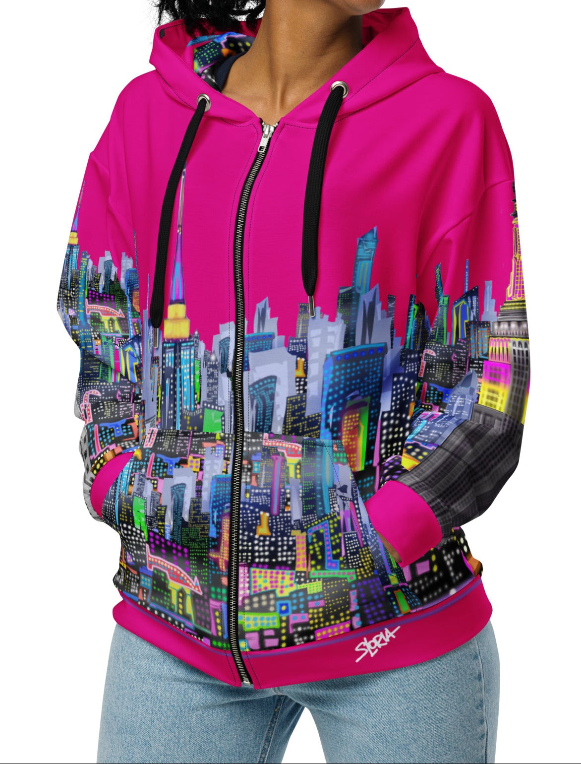 Person wearing a fuchsia pink hoodie with cityscape Loria NYC Art design on a white background