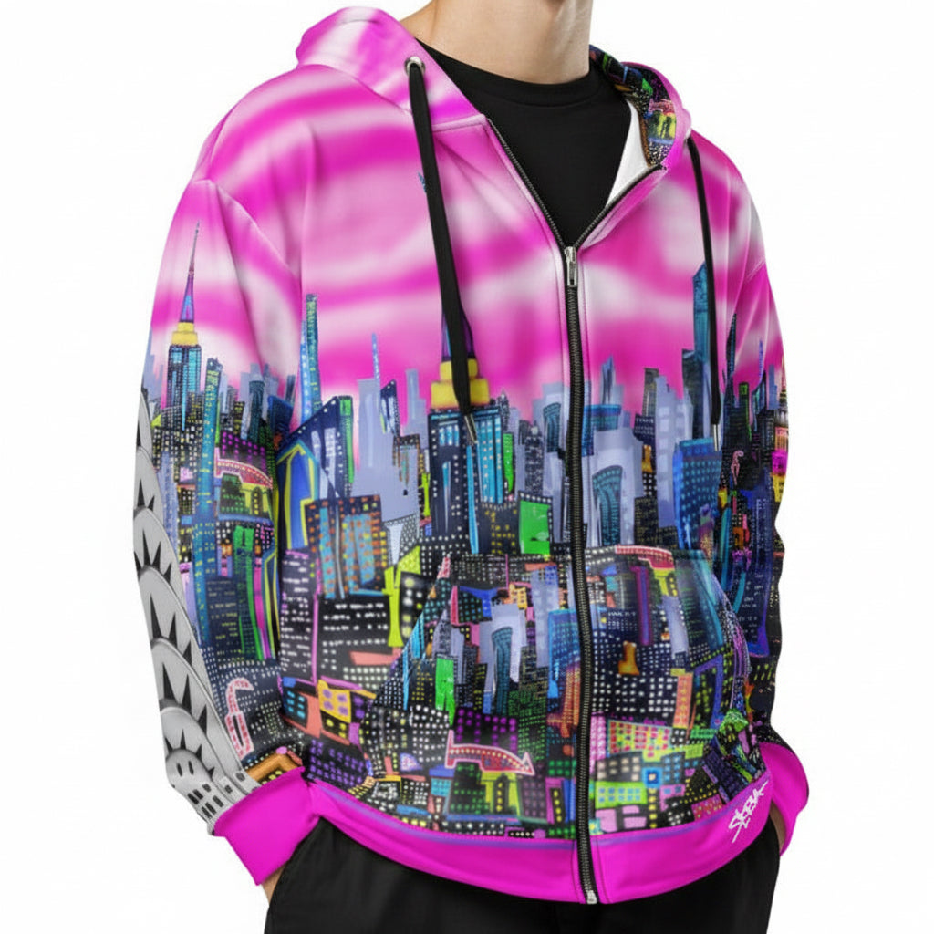 Person wearing a colorful Loria NYC Art hoodie with a cityscape design on a white background