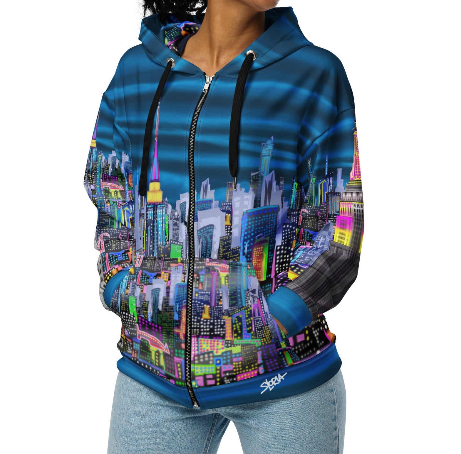 Girl wearing Blue Hoodie with cityscape design by Loria NYC Art on a white background