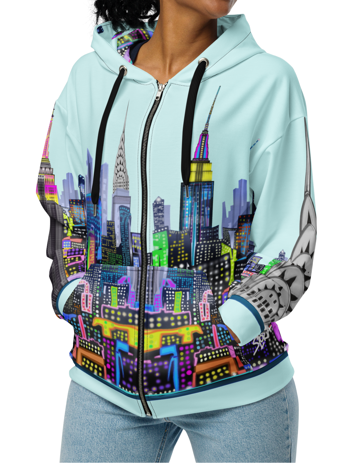 Woman wearing a hoodie with a colorful cityscape Loria NYC Art design on a white background