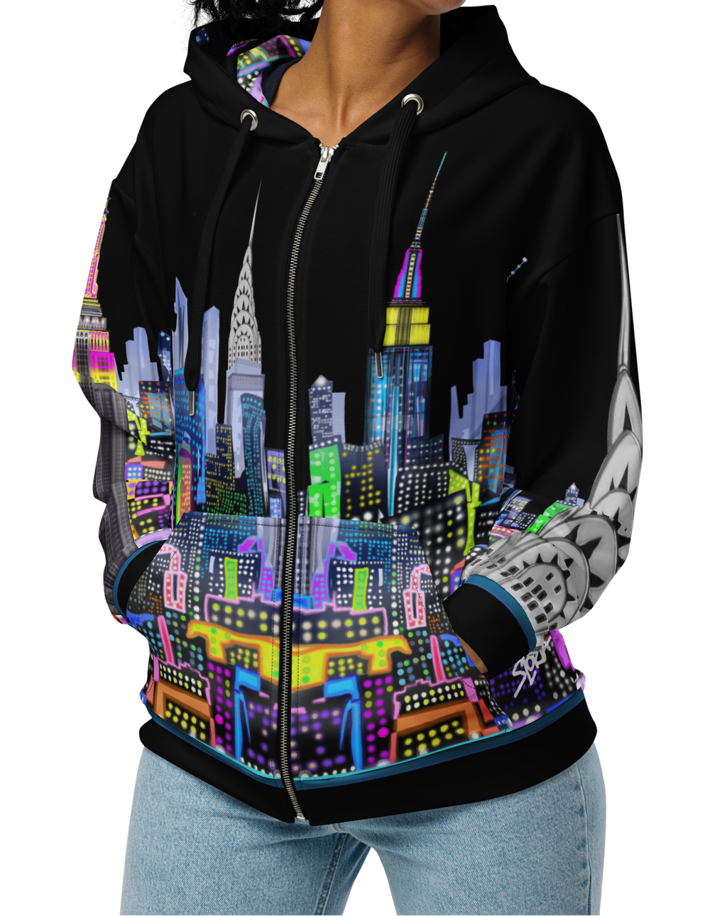 Person wearing a Loria NYC Art black hoodie with a colorful cityscape design on a white background